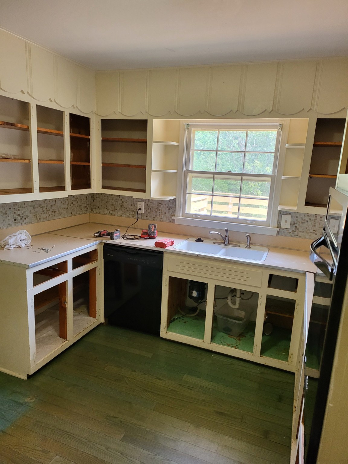 Original sink wall and cabinets before renovation