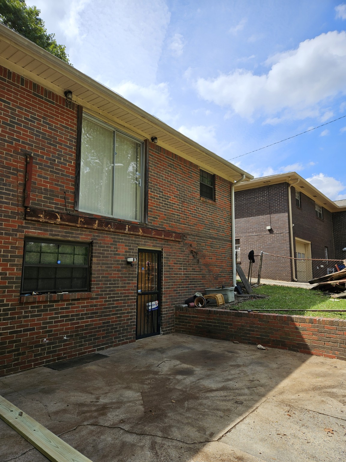 Back of house and ground area before the new raised deck